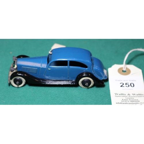 250 - Dinky Toys Rolls Royce (30b). A 1936-1940 example in blue with open black chassis, smooth black whee... 