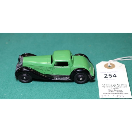 254 - Dinky Toys Bentley Sports Coupe (36b). An example in green with black moulded chassis, black ridged ... 