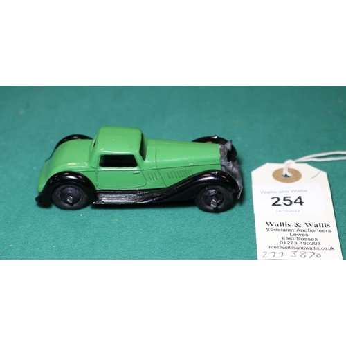 254 - Dinky Toys Bentley Sports Coupe (36b). An example in green with black moulded chassis, black ridged ... 