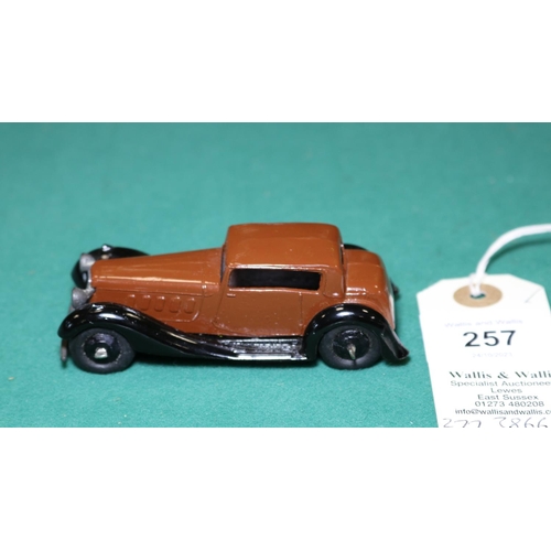 257 - Dinky Toys Humber Vogue (36c). A Post War example in dark brown with black moulded chassis, black ri... 