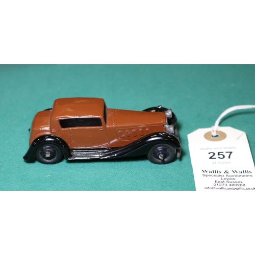 257 - Dinky Toys Humber Vogue (36c). A Post War example in dark brown with black moulded chassis, black ri... 