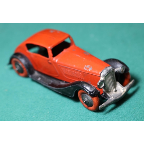 265 - Dinky Toys 24 Series Super Streamlined Saloon 24e. An example in red with black 'criss-cross chassis... 