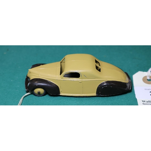 270 - Dinky Toys Lincoln Zephyr (39cu). A U.S. export issue in tan with dark brown wings, ridged tan wheel... 