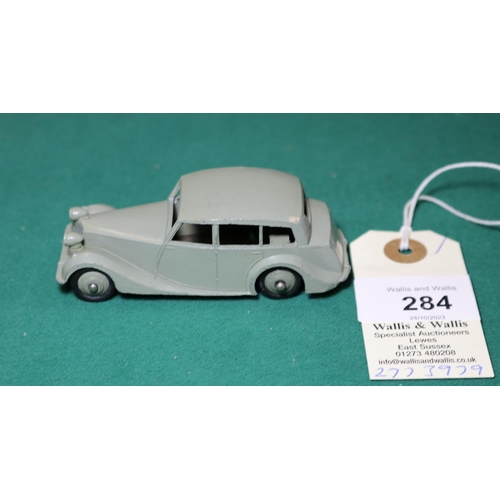 284 - Dinky Toys Triumph 1800 (40b). An example in light grey with darker grey wheels and black rubber tyr... 