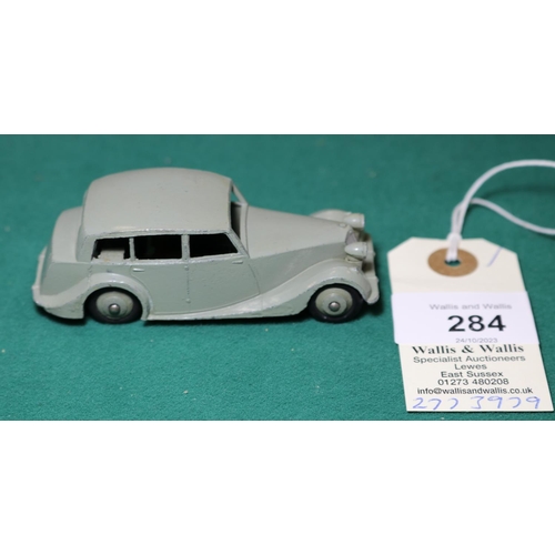 284 - Dinky Toys Triumph 1800 (40b). An example in light grey with darker grey wheels and black rubber tyr... 