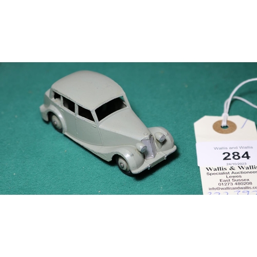 284 - Dinky Toys Triumph 1800 (40b). An example in light grey with darker grey wheels and black rubber tyr... 