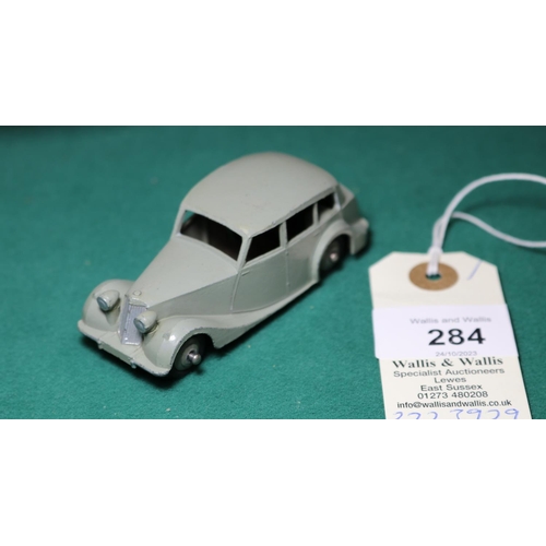 284 - Dinky Toys Triumph 1800 (40b). An example in light grey with darker grey wheels and black rubber tyr... 