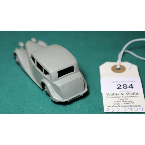 284 - Dinky Toys Triumph 1800 (40b). An example in light grey with darker grey wheels and black rubber tyr... 