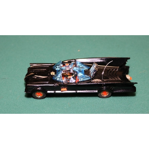 447 - Corgi 267 Batmobile. Lovely example complete with figures of Batman & Robin, All glass is intact and... 