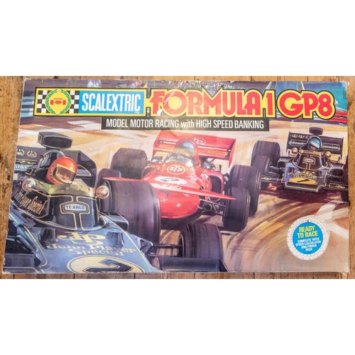 55 - A large quantity of Scalextric with boxed sets and accessories. Including 3x sets; a Formula 1 GP8 s... 