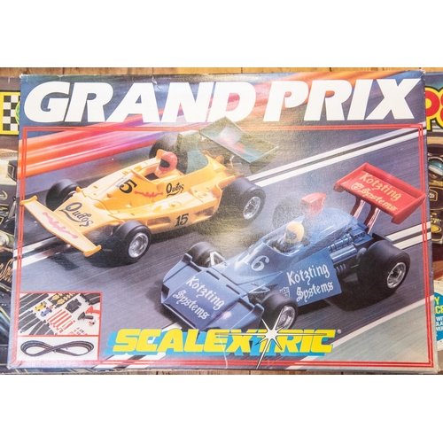 55 - A large quantity of Scalextric with boxed sets and accessories. Including 3x sets; a Formula 1 GP8 s... 