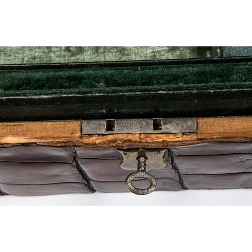 73 - Antique Crocodile skin Jewellery box with removable inner tray, Also comes with its key. Has the ori... 