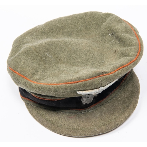 167 - A good quality copy of a Third Reich Waffen SS peaked cap, field grey with alloy badges. GC £300-350
