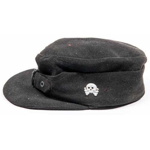 173 - A Third Reich black cloth peaked field cap of the Hitler Youth, with embroidered badge and alloy sku... 