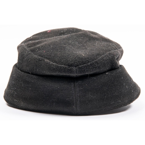 173 - A Third Reich black cloth peaked field cap of the Hitler Youth, with embroidered badge and alloy sku... 