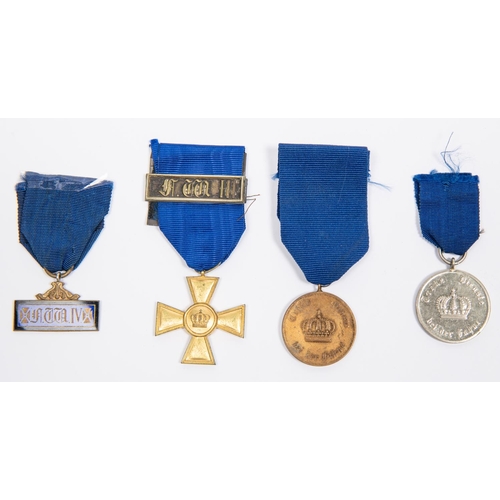136 - Three Prussian Long Service medals: officer's gilt 15 year cross with F W III bar; 12 years medal; a... 