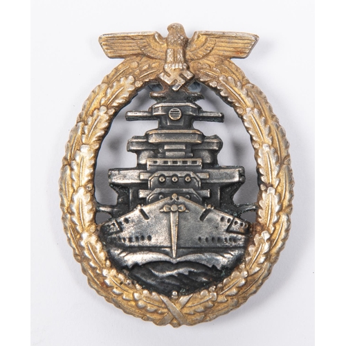 120 - A Third Reich High Seas Fleet War badge, grey with gilt wreath, the reverse marked 