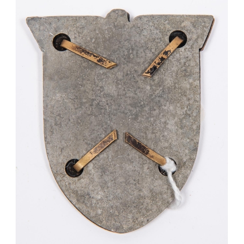 128 - A Third Reich 1943 Kuban Shield, with copper washed finish, 4 band over blades, and steel backing pl... 