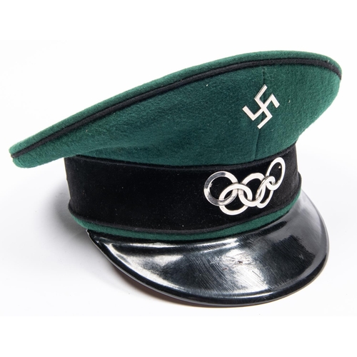 174 - A Third Reich Olympic official's SD cap, green cloth with plated mounts. GC £270-300