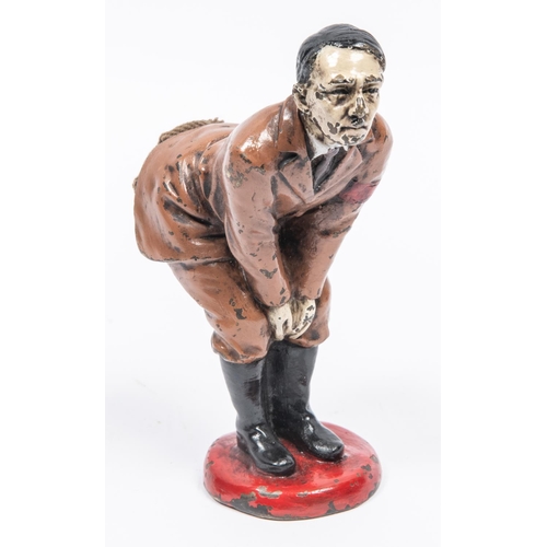 103 - An unusual pin cushion caricature model of Adolf Hitler, bending over, made of metal, painted and wi... 
