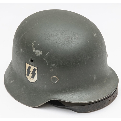 155 - A Third Reich M1936 SS helmet, single decal right side, field grey finish. GC £200-250