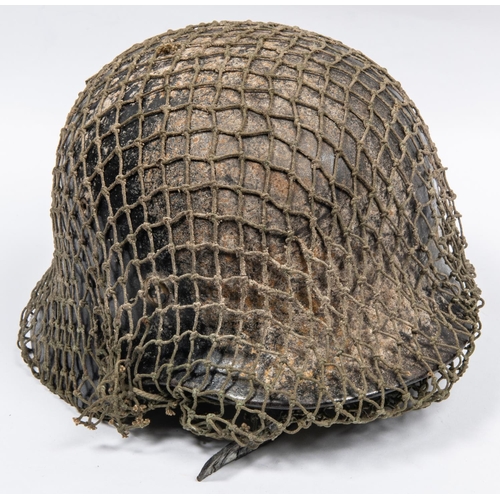 157 - A Third Reich steel helmet M1936, leather lining, with British netting cover GC (lining dried up). £... 