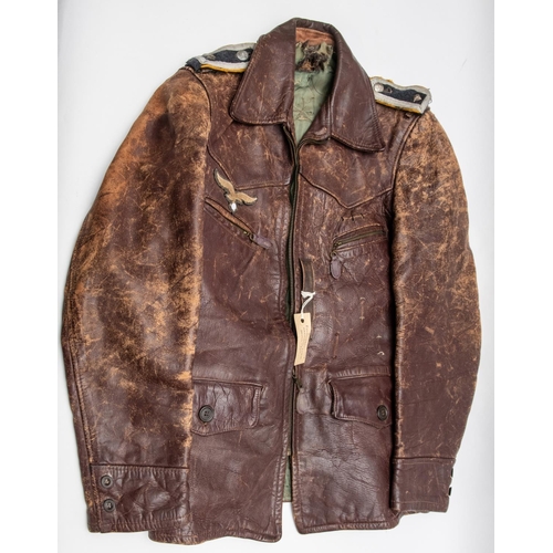 176 - A Third Reich Luftwaffe NCO's brown leather flying jacket, embroidered breast eagle and braid trimme... 