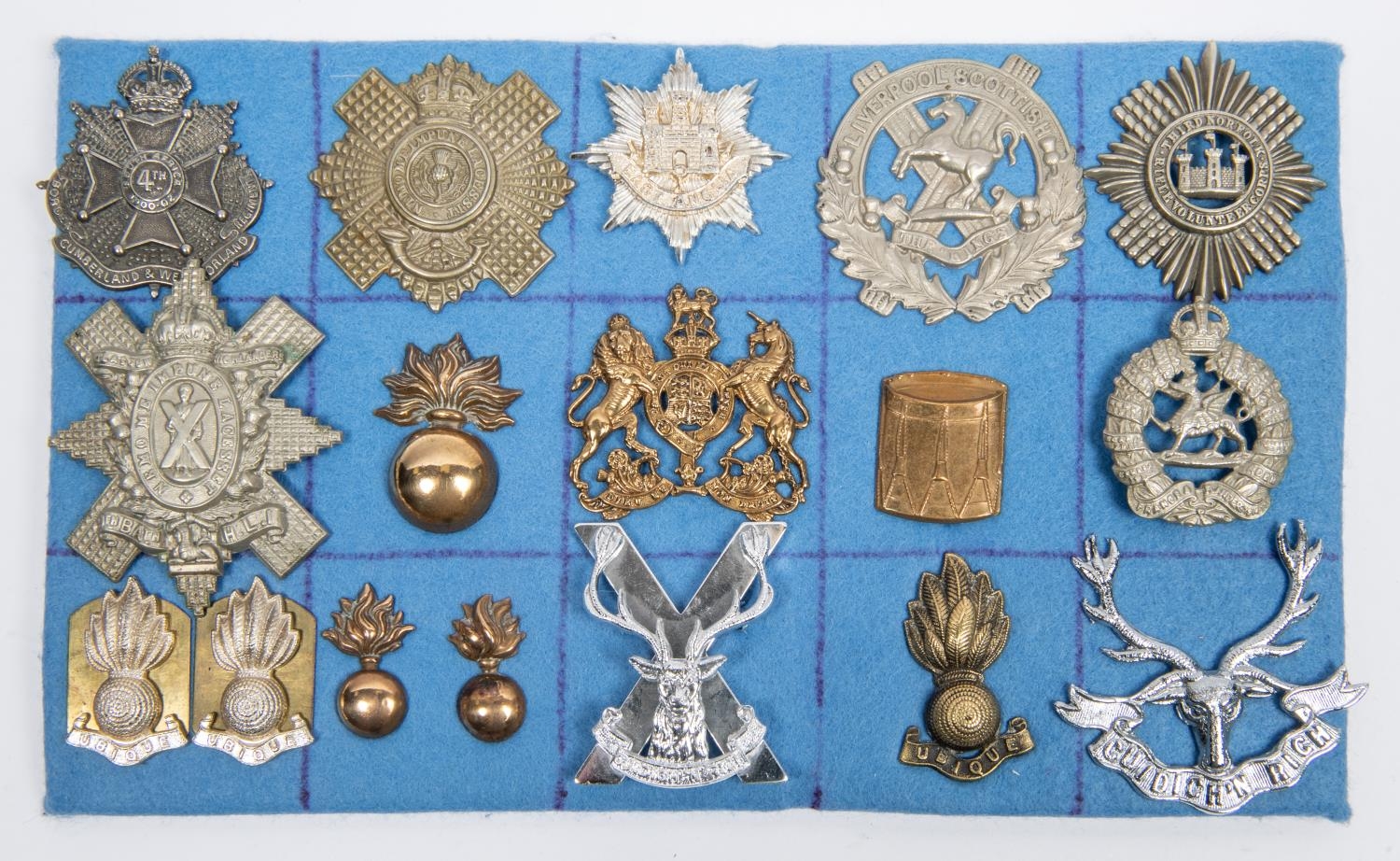 15 military badges, including cap badge of Third Norfolk Rifle ...