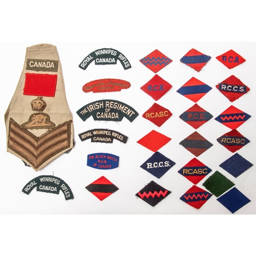 317 - WWII Canadian cloth insignia: 6 shoulder titles, 20 formation signs plus arm brassard 1st Canadian D... 