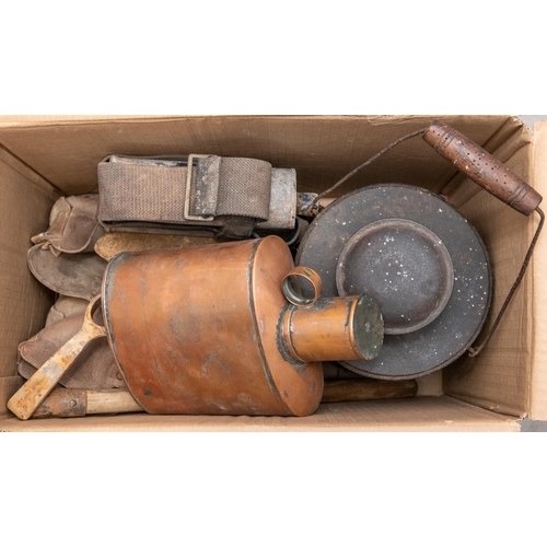 34 - A WWI Trench lantern, a pioneer saw in its leather pouch; a pair of possibly WWI marching boots; a W... 
