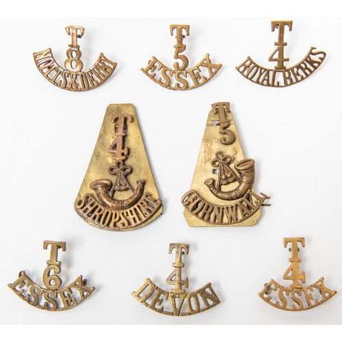 299 - 7 Territorial brass shoulder titles: T/4/DEVON;  three piece T/5/ bugle/ CORNWALL on backplate; T/4.... 