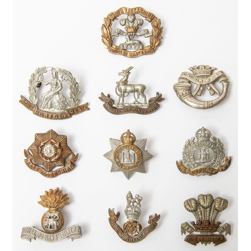 250 - 10 early lugged examples of Infantry cap badges: Royal Warwickshire, Norfolk, Devonshire, Suffolk, E... 