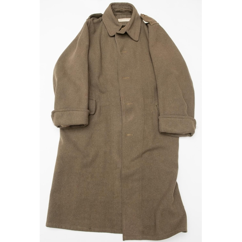 353 - An extremely scarce WWI OR's khaki single breasted greatcoat, brass GS buttons, printed label sewn i... 