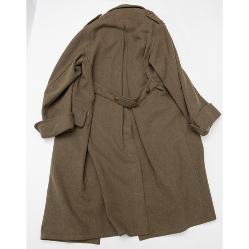 353 - An extremely scarce WWI OR's khaki single breasted greatcoat, brass GS buttons, printed label sewn i... 