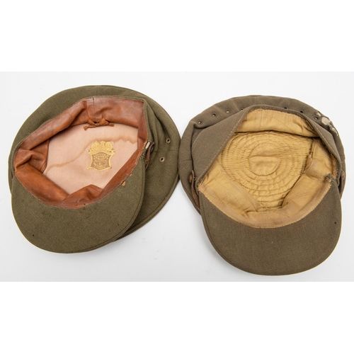 403 - A WWI Royal Artillery officer's khaki SD cap, bronze badge and side buttons, eyelet ventilatiion at ... 