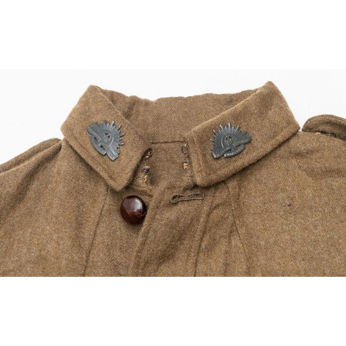 364 - A scarce Australian WWI type Anzac SD jacket, khaki serge with button cuffs and self belt, leather 