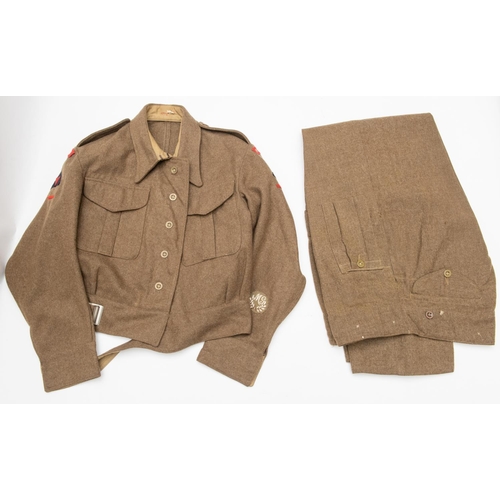 370 - A good 1940 patt khaki BD blouse, Middlesex Regt, 3rd Div insignia, label dated 1942; also a pair of... 