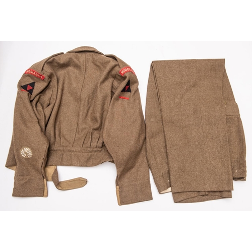 370 - A good 1940 patt khaki BD blouse, Middlesex Regt, 3rd Div insignia, label dated 1942; also a pair of... 