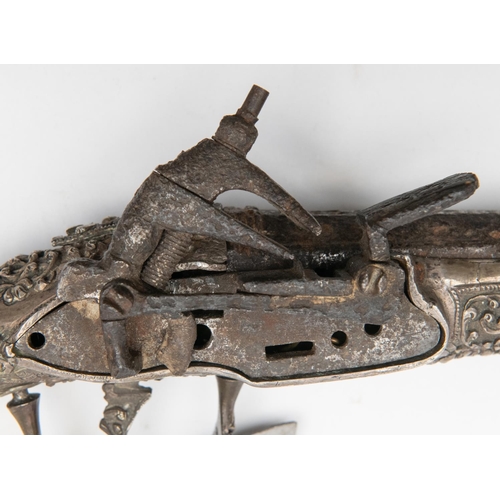 522 - An 18th century Balkan 22 bore miquelet flintlock holster pistol, 19