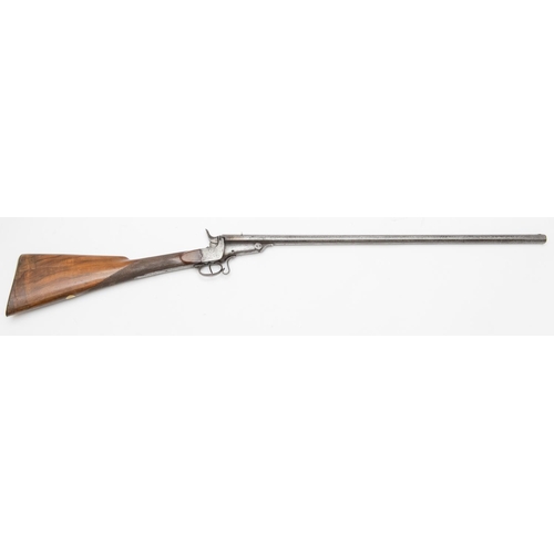 546 - A 7mm rim fire saloon or garden gun, tip down octagonal twist barrel 25¾