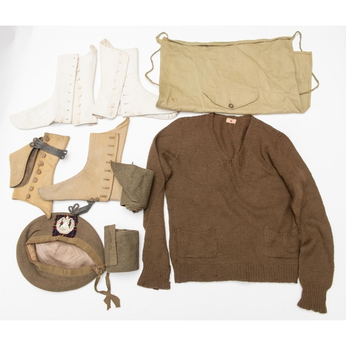 382 - A WWII kilt apron, 2 pairs of WW1 Highland spats, a pair of long khaki puttees; also a 