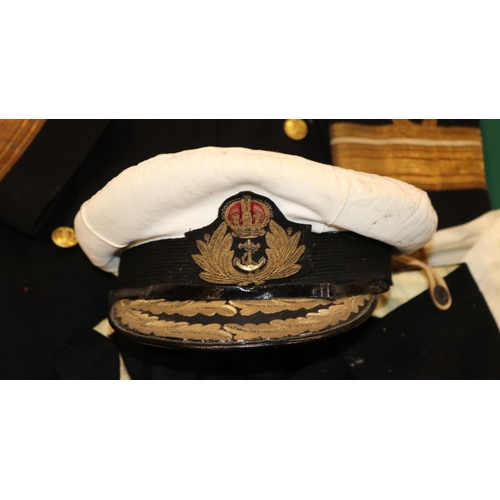 402 - A WWII Royal Navy Flag Officers cap, bullion embroidered peak, together with jacket, trousers and sh... 