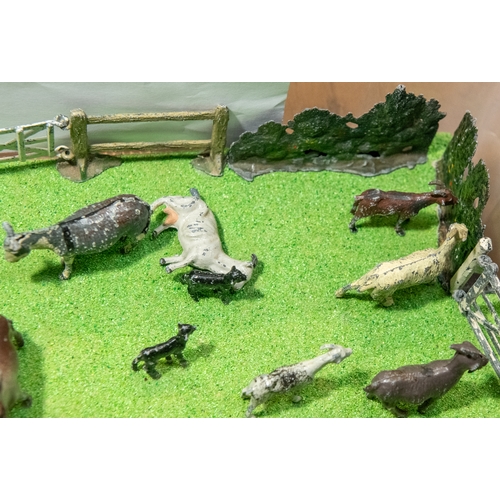 107 - Britains Hunting scene diorama. Bespoke and well made, comprising 8 mounted huntsman, 1 on foot, 12 ... 