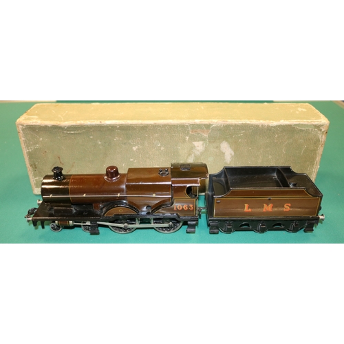 206 - An original Bassett-Lowke O Gauge 4-4-0 compound tender Locomotive. A 3-rail electric example in lin... 