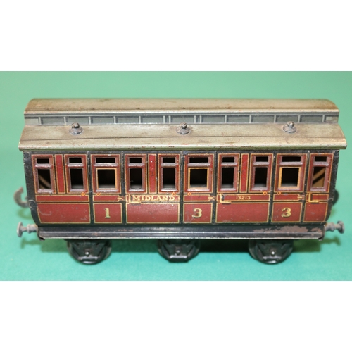 209 - A rare O gauge Carette  Clemenson 6 wheeled clearstory passenger coach. A composite 1st/3rd class co... 