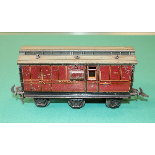 210 - A rare O gauge Carette  Clemenson 6 wheeled clearstory Guards Van. in lined maroon Midland Railway l... 