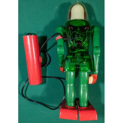 237 - Dux Astroman Electric Robot toy. Comes with remote control. Robot has a clear green plastic body wit... 