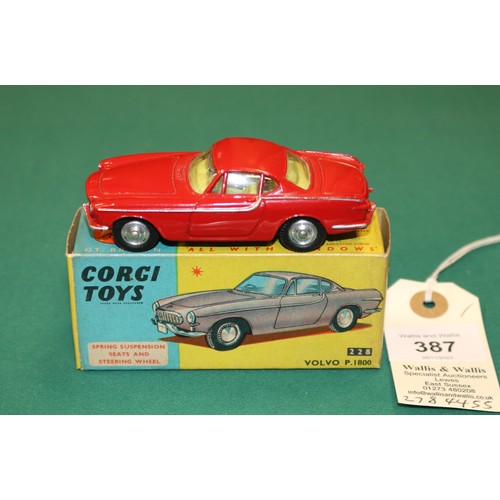 387 - Corgi Toys Volvo P.1800 (228). An example in bright red with yellow interior, dished spun wheels and... 