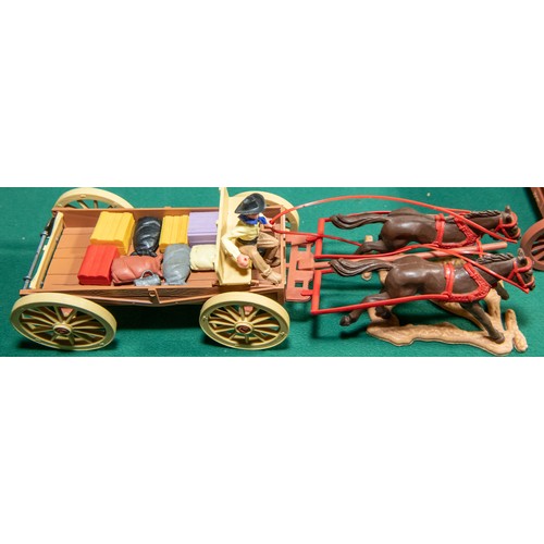 96 - 6 plastic Timpo wagons, to include, Clay County Jail wagon, with Horse and Figures, 2 Covered wagons... 