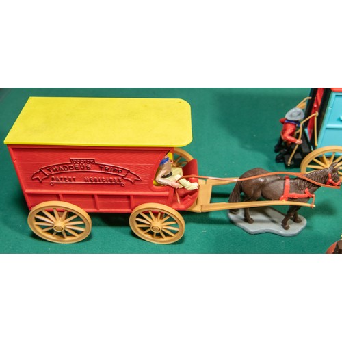 96 - 6 plastic Timpo wagons, to include, Clay County Jail wagon, with Horse and Figures, 2 Covered wagons... 